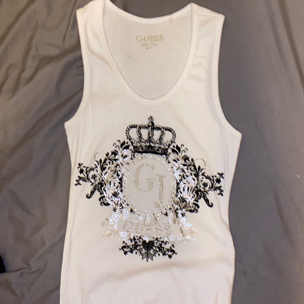 4 shirts Guess, and Bebe brand all size small